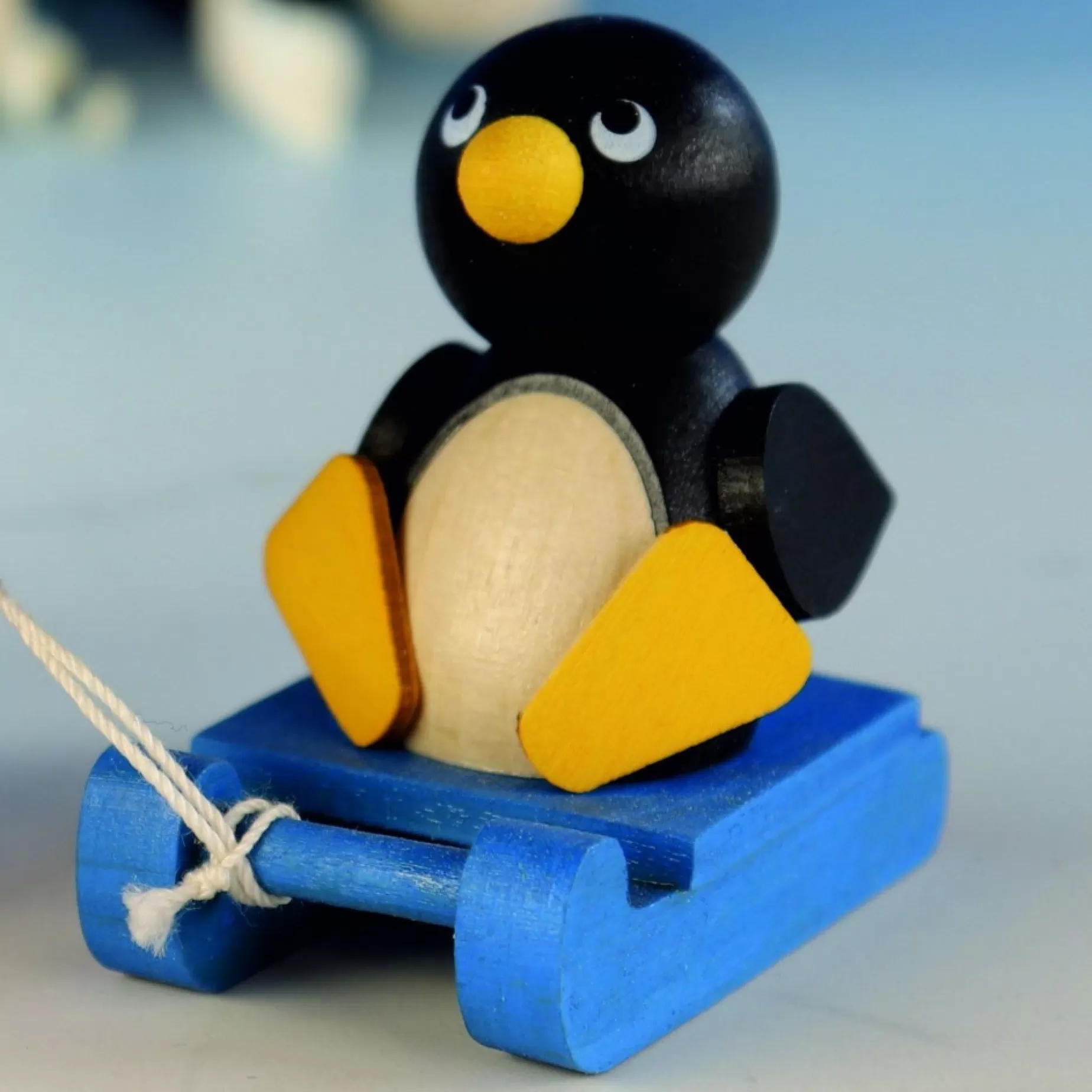 Paul Ullrich Weihnachtsmann Collectibles - Francine The Penguin On A Sled (Single) | Rudolph & Friends Collectibles
